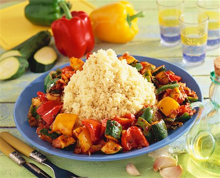 Couscous with vegetables (courgettes, peppers, tomatoes) Stock Photo - Premium Royalty-Free, Code: 659-01850498