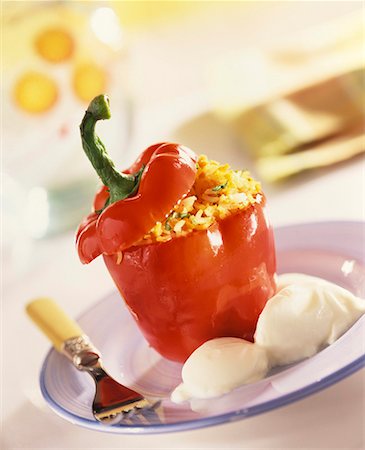 stuffed vegetable - Pepper with rice stuffing, feta and yoghurt Stock Photo - Premium Royalty-Free, Code: 659-01850499