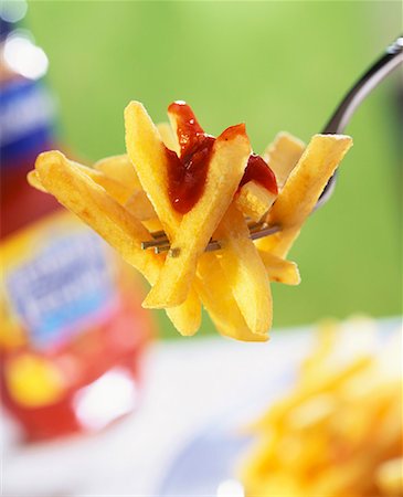 simsearch:659-01854023,k - Chips mit Ketchup auf Gabel Stockbilder - Premium RF Lizenzfrei, Bildnummer: 659-01850493