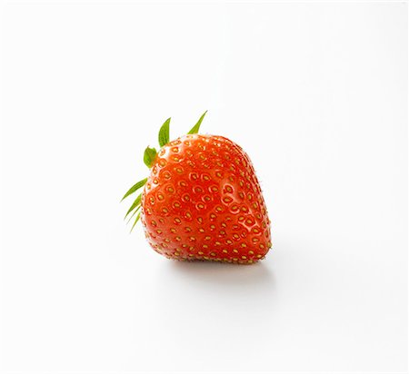 strawberries white background nobody - A strawberry Stock Photo - Premium Royalty-Free, Code: 659-01850850