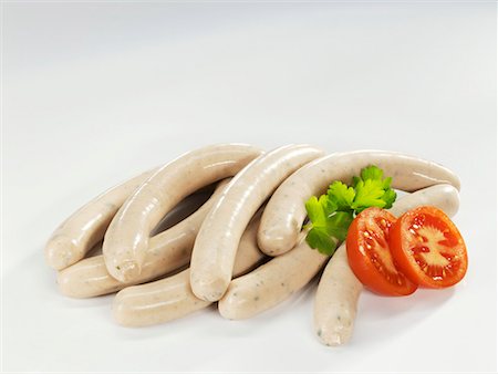 salsichão de porco - Raw pork sausages Foto de stock - Royalty Free Premium, Número: 659-01851173