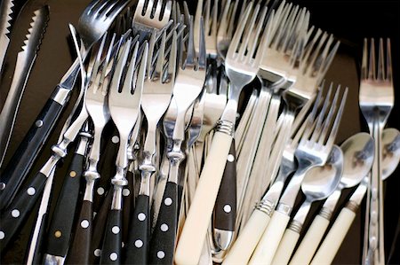 flatware - Forks and teaspoons Foto de stock - Sin royalties Premium, Código: 659-01851239