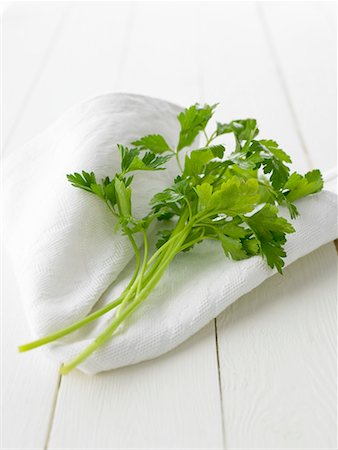 parsley - Flat leaf parsley on white cloth Stock Photo - Premium Royalty-Free, Code: 659-01851459
