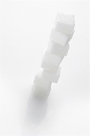 sugar cube on white - Tower of sugar cubes Stock Photo - Premium Royalty-Free, Code: 659-01851493