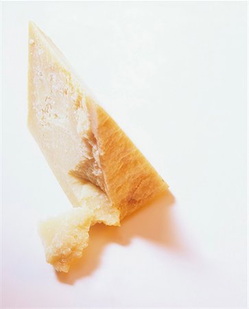 parmigiano - A piece of Parmesan Stock Photo - Premium Royalty-Free, Code: 659-01851773