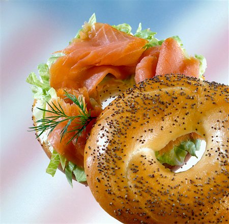 salmon roll - Poppy seed bagel filled with salmon Stock Photo - Premium Royalty-Free, Code: 659-01851876