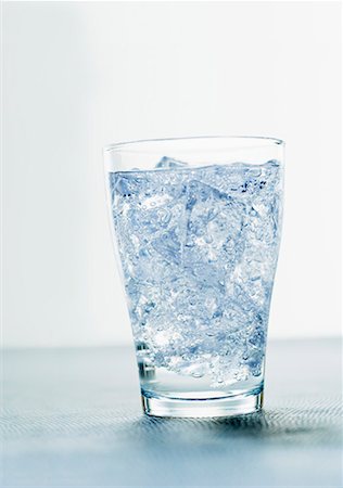 Glass of mineral water with ice cubes Stock Photo - Premium Royalty-Free, Code: 659-01851927