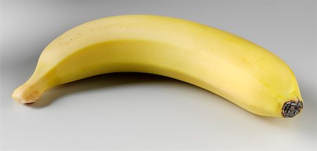 A whole banana Stock Photo - Premium Royalty-Free, Code: 659-01851920