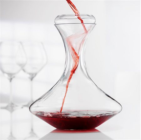 Red wine being decanted Stock Photo - Premium Royalty-Free, Code: 659-01852156