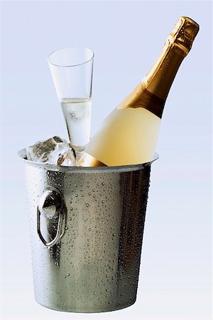 Sparkling wine still life with cooler, bottle and glass Stock Photo - Premium Royalty-Free, Code: 659-01852246