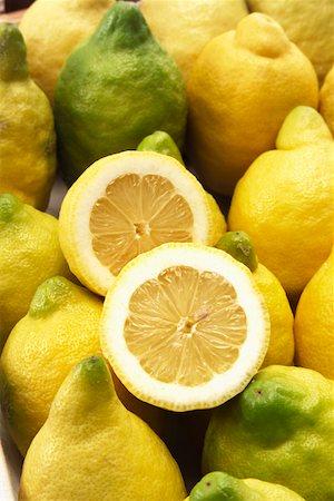 Organic lemons, one halved Stock Photo - Premium Royalty-Free, Code: 659-01852394