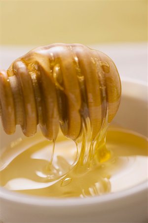 simsearch:659-01852572,k - Hone running from a honey dipper (1) Stock Photo - Premium Royalty-Free, Code: 659-01852605