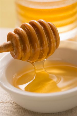 simsearch:659-01852572,k - Honey running from a honey dipper Stock Photo - Premium Royalty-Free, Code: 659-01852606