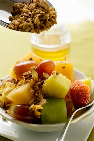 simsearch:659-01852596,k - Muesli with mixed fruit and cereal Stock Photo - Premium Royalty-Free, Code: 659-01852600