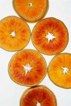 Slices of blood orange, variety 'Tarocco' Foto de stock - Sin royalties Premium, Código: 659-01852700