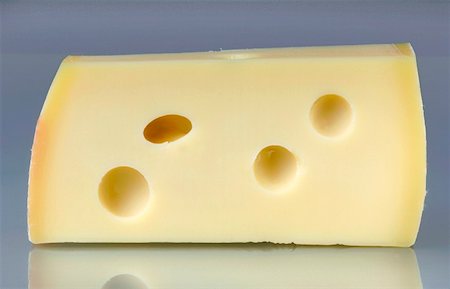 simsearch:659-01854208,k - A piece of Emmental cheese Stock Photo - Premium Royalty-Free, Code: 659-01852965