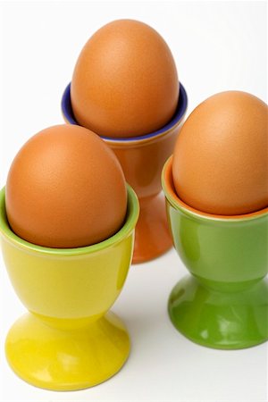 simsearch:659-01850865,k - Three eggs in eggcups Stock Photo - Premium Royalty-Free, Code: 659-01853101