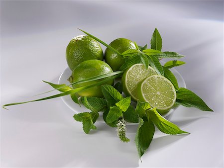 simsearch:659-03523803,k - Limes and assorted herbs on a plate Stock Photo - Premium Royalty-Free, Code: 659-01853157