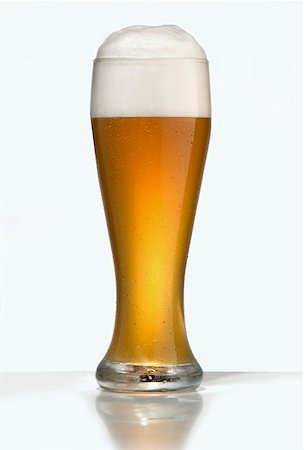 simsearch:659-03527526,k - Weissbier in glass Stock Photo - Premium Royalty-Free, Code: 659-01853241