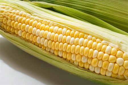 simsearch:659-01854541,k - A corn cob with husks Stock Photo - Premium Royalty-Free, Code: 659-01853363