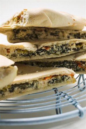 simsearch:659-01847562,k - Pieces of spinach, ricotta and pepper pie Stock Photo - Premium Royalty-Free, Code: 659-01853466