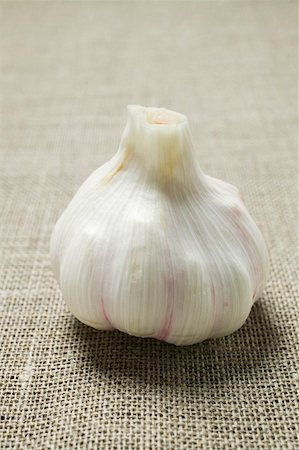 A garlic bulb Foto de stock - Sin royalties Premium, Código: 659-01853513