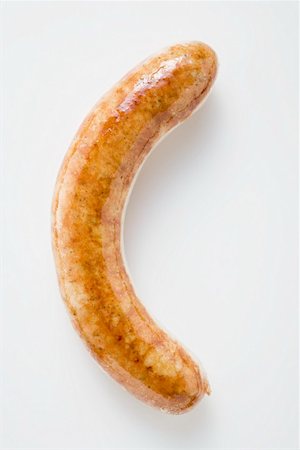 salchicha bratwurst - Sausage (bratwurst) on white background Foto de stock - Sin royalties Premium, Código: 659-01864037