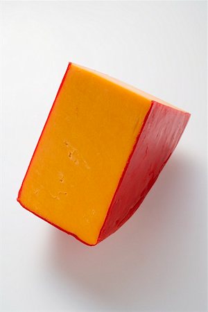 Coin de fromage Cheddar Photographie de stock - Premium Libres de Droits, Code: 659-01864060