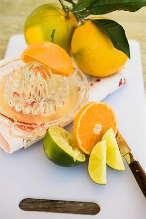 simsearch:659-03525022,k - Limes, clementine, oranges and citrus squeezer Stock Photo - Premium Royalty-Free, Code: 659-01864137