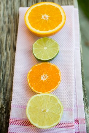 Assorted citrus fruit, halved Stock Photo - Premium Royalty-Free, Code: 659-01864146