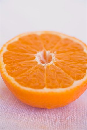 simsearch:659-01846643,k - Half a clementine Stock Photo - Premium Royalty-Free, Code: 659-01864177