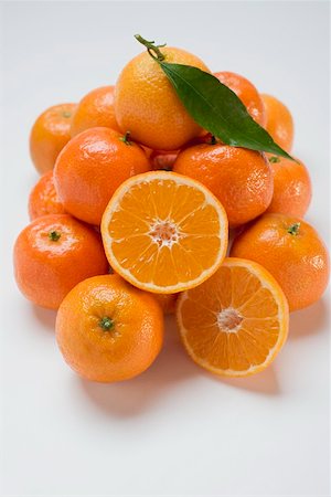 A heap of clementines Fotografie stock - Premium Royalty-Free, Codice: 659-01864196