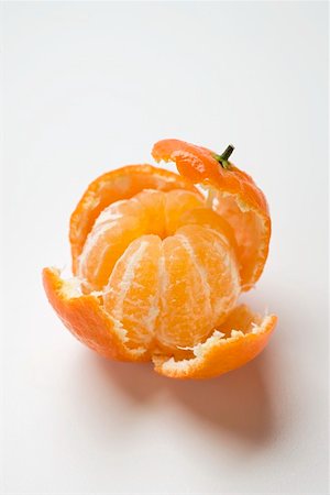 Peeled clementine Foto de stock - Royalty Free Premium, Número: 659-01864237