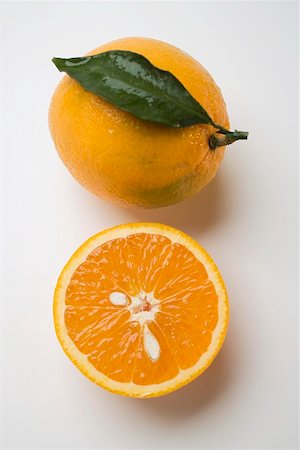 simsearch:659-03525522,k - Whole orange with leaf and orange half Stock Photo - Premium Royalty-Free, Code: 659-01864233