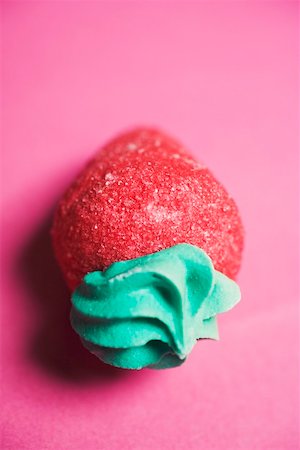 simsearch:659-03530263,k - Sugar strawberry on red background Stock Photo - Premium Royalty-Free, Code: 659-01864253