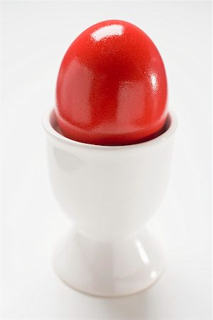 simsearch:659-01850865,k - Red Easter egg in egg cup Stock Photo - Premium Royalty-Free, Code: 659-01864280