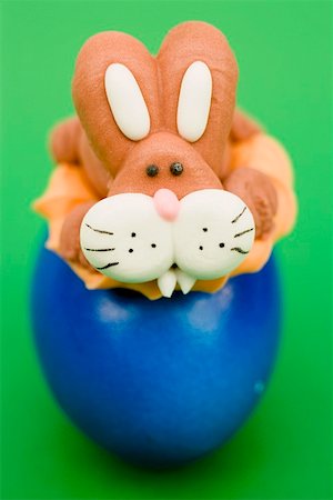 simsearch:659-01865815,k - Marzipan Easter Bunny on blue egg Stock Photo - Premium Royalty-Free, Code: 659-01864350