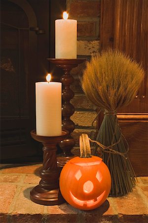 simsearch:659-01864379,k - Autumn decorations: candles, cereal sheaf & pumpkin lantern Stock Photo - Premium Royalty-Free, Code: 659-01864381