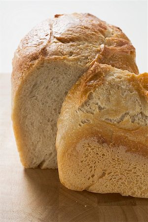 White tin loaf with the end crust cut Foto de stock - Sin royalties Premium, Código: 659-01864577