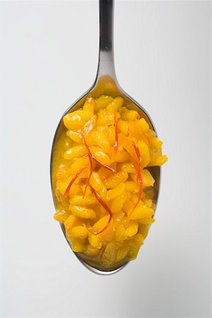 saffron - A spoonful of saffron risotto (overhead view) Stock Photo - Premium Royalty-Free, Code: 659-01864594