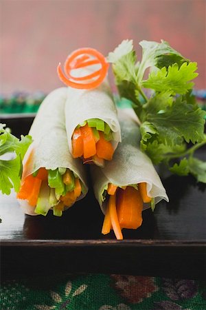 Vietnamese spring rolls with vegetable filling Stock Photo - Premium Royalty-Free, Code: 659-01864644
