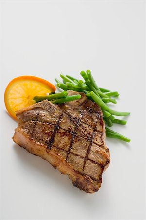 simsearch:659-03526965,k - Grilled T-bone steak with French beans Foto de stock - Sin royalties Premium, Código: 659-01864655