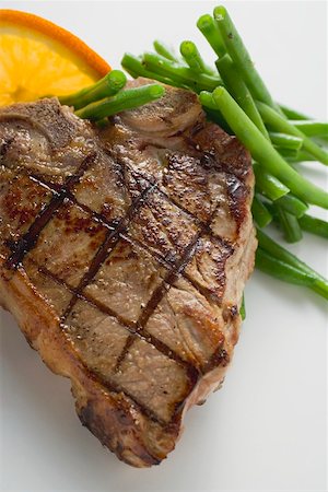 Grilled T-bone steak with French beans Fotografie stock - Premium Royalty-Free, Codice: 659-01864656