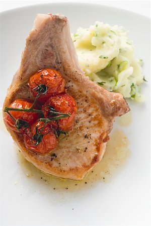 simsearch:659-01852978,k - Fried pork chop with cherry tomatoes and mashed potato Stock Photo - Premium Royalty-Free, Code: 659-01864677