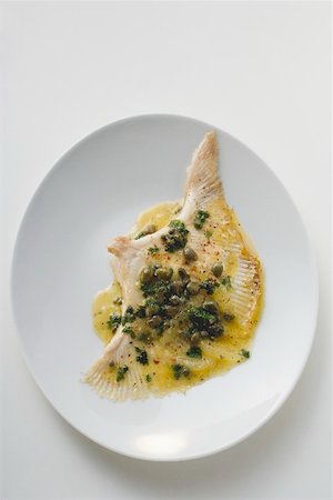 skate fish recipes - Skate in caper sauce (overhead view) Stock Photo - Premium Royalty-Free, Code: 659-01864681