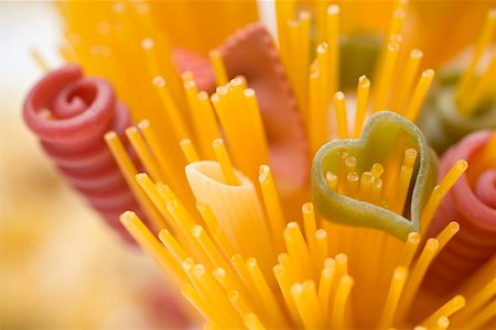 Spaghetti and coloured pasta (detail) Stock Photo - Premium Royalty-Free, Code: 659-01864853