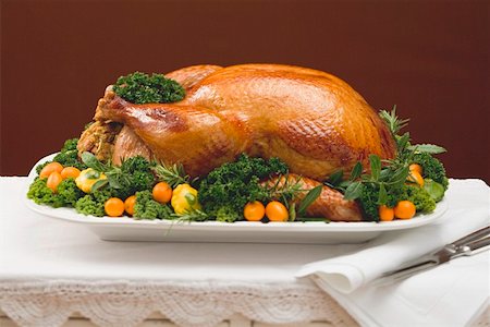 pavo (alimento) - Stuffed roast turkey with kumquats and herbs Foto de stock - Sin royalties Premium, Código: 659-01864937