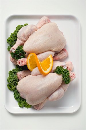 simsearch:659-03529018,k - Two fresh chickens garnished with parsley and orange Stock Photo - Premium Royalty-Free, Code: 659-01864945