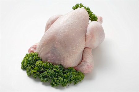 simsearch:659-03528720,k - Fresh chicken garnished with parsley Stock Photo - Premium Royalty-Free, Code: 659-01864947