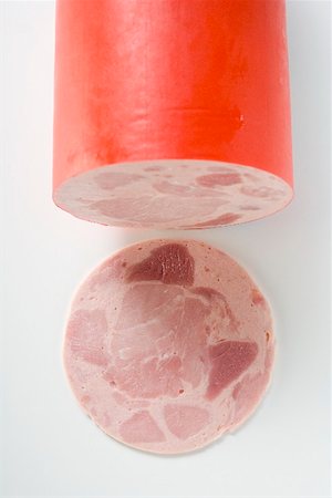 simsearch:659-01865070,k - Schinkenwurst (ham sausage) with a slice cut Foto de stock - Sin royalties Premium, Código: 659-01865043